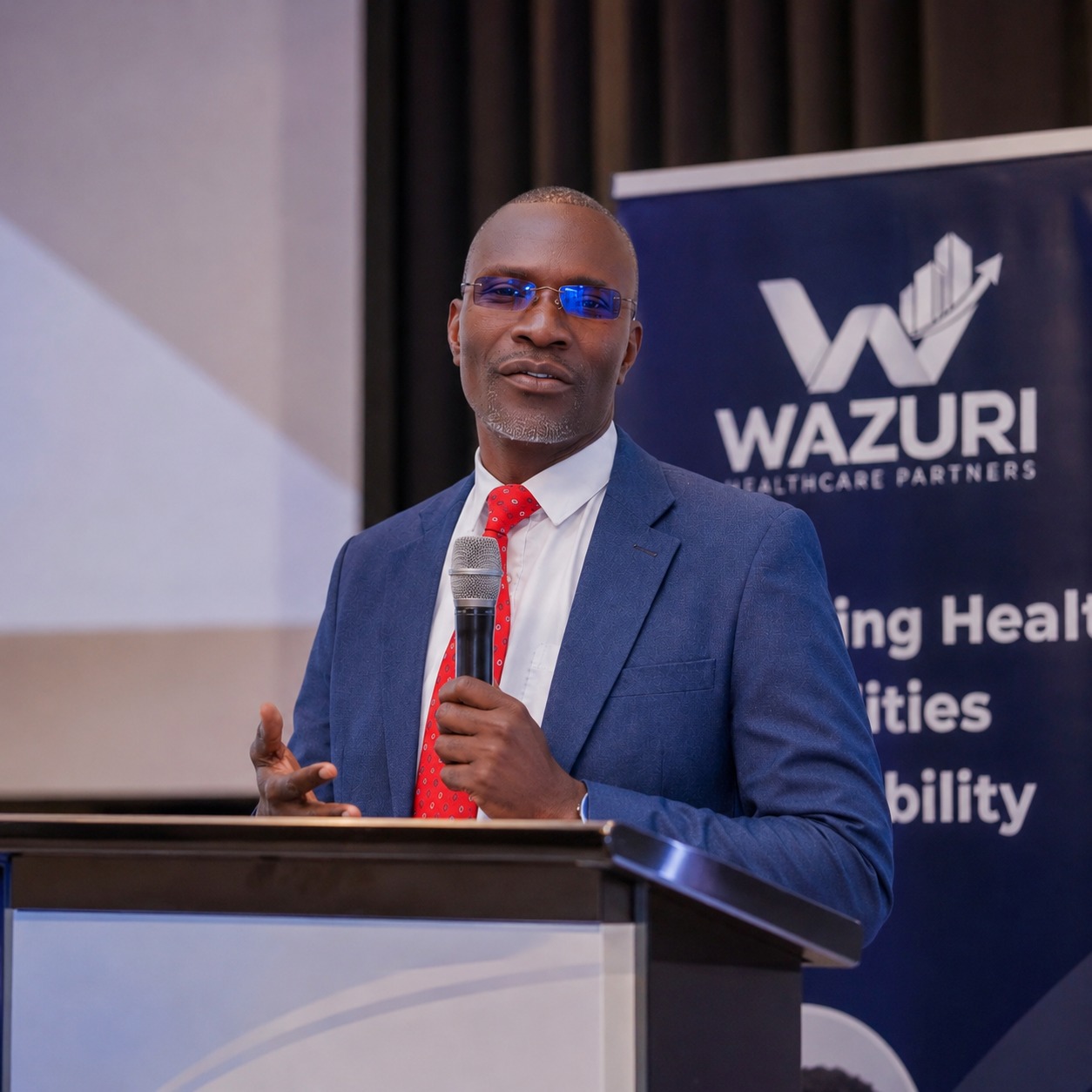 Wazuri Healthcare Partners leadership speaking at an event